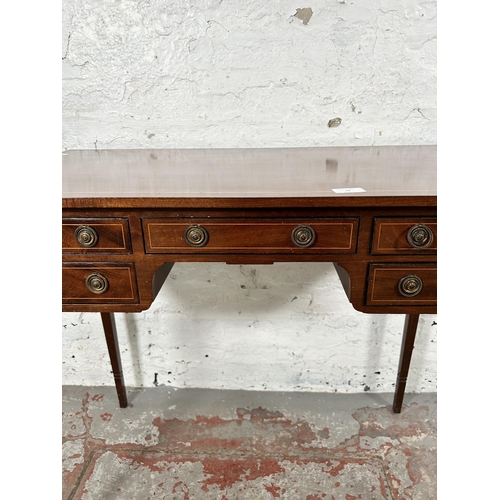 10 - An Edwardian inlaid mahogany writing table with five drawers and tapering supports - approx. 74cm hi... 