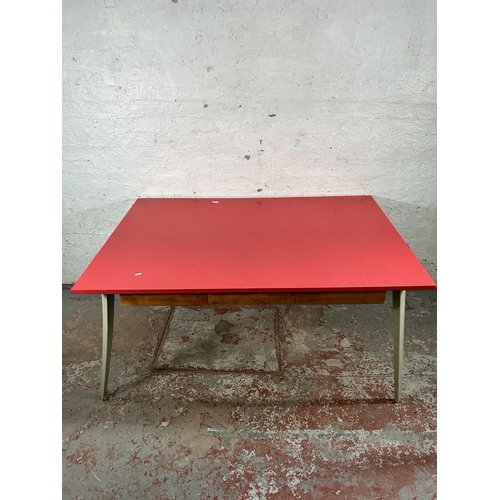 13 - A mid 20th century Ernest Race style red laminate and cast metal office desk with three drawers - ap... 