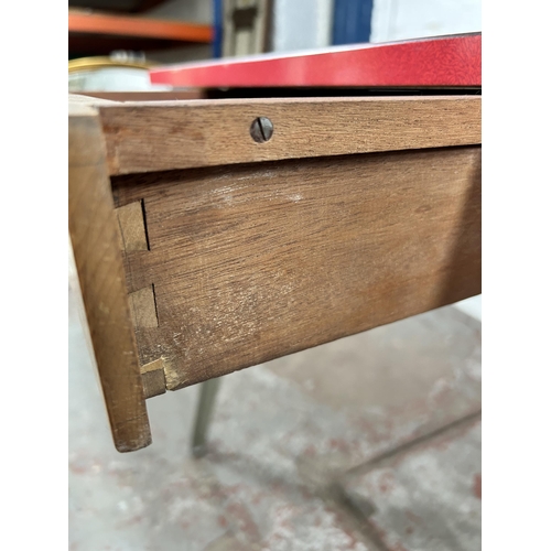 13 - A mid 20th century Ernest Race style red laminate and cast metal office desk with three drawers - ap... 