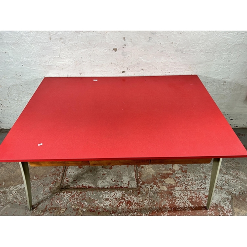 13 - A mid 20th century Ernest Race style red laminate and cast metal office desk with three drawers - ap... 