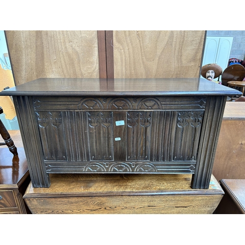 131 - A Strongbow Furniture carved oak blanket box