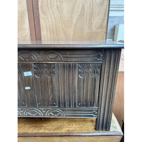131 - A Strongbow Furniture carved oak blanket box