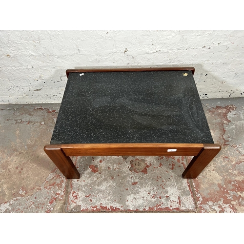 18 - A mid 20th century teak and black marble effect rectangular coffee table