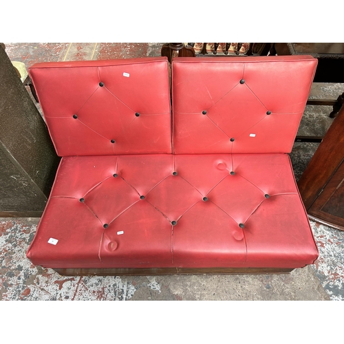 44 - A 1950s red vinyl two seater modular restaurant bench