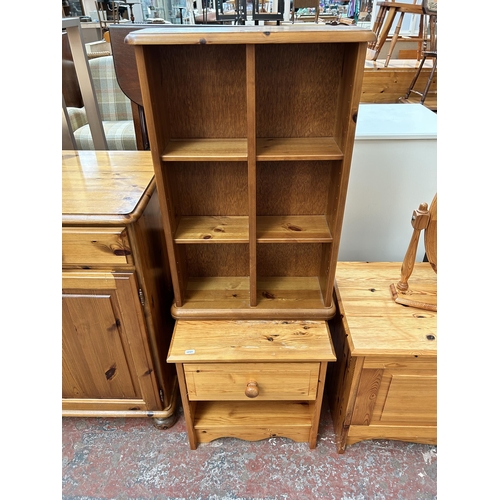 52 - Four pieces of pine furniture to include blanket box, bedside cabinet etc.