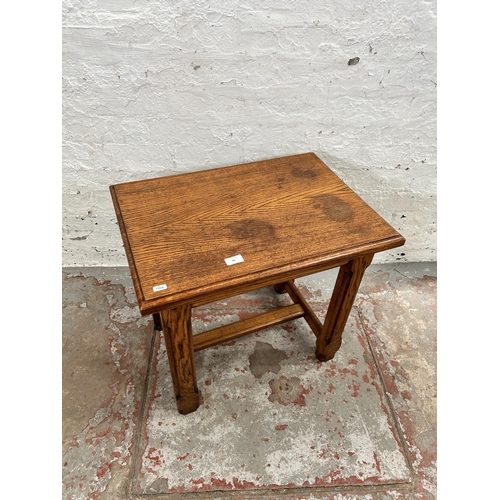 59 - An Arts and Crafts style solid oak rectangular side table