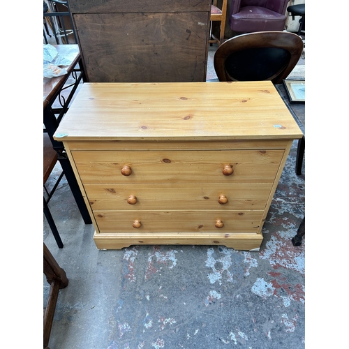 60 - A modern pine effect chest of three drawers