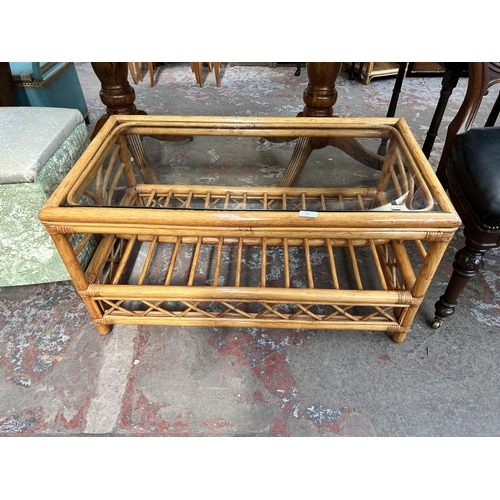 69 - A bamboo and glass rectangular two tier coffee table