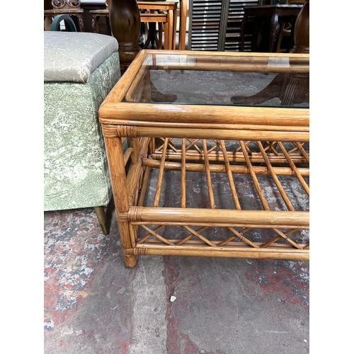 69 - A bamboo and glass rectangular two tier coffee table