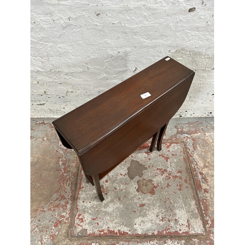 75 - An Edwardian mahogany drop leaf Sutherland table