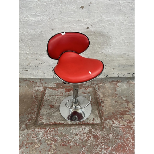 79 - A modern red vinyl and chrome plated kitchen bar stool