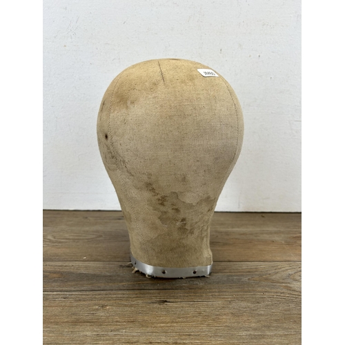 670B - A 1960s millinery hat block - approx. 27cm high