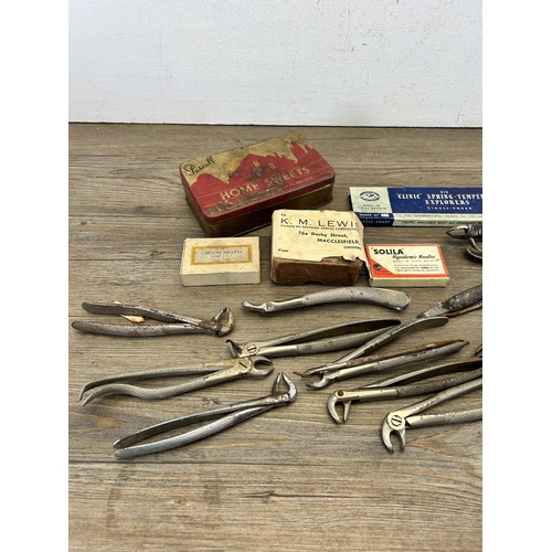 671 - A collection of vintage dentist's tools and accessories