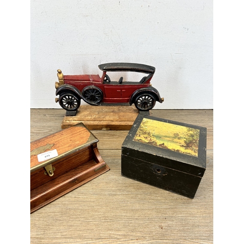 673 - Three items, Indian hardwood and brass desk tidy, early 20th century ebonised and papier-mâché tea c... 