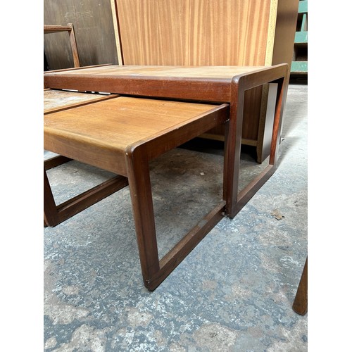 49 - A 1960s teak nest of three tables