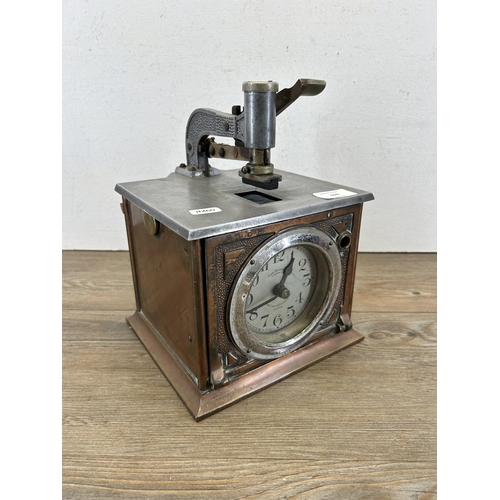 676 - An early 20th century Time Recorders Ltd. of Leeds copper and steel clocking in machine - approx. 27... 