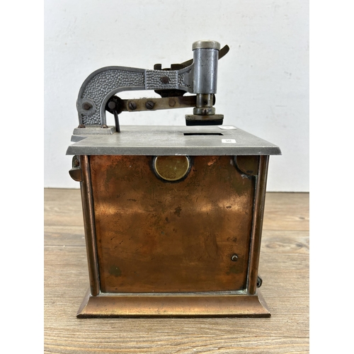 676 - An early 20th century Time Recorders Ltd. of Leeds copper and steel clocking in machine - approx. 27... 