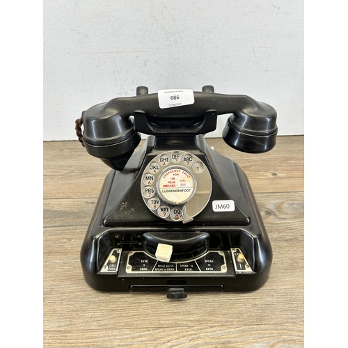 686 - An early 20th century Siemens Brothers & Co. Ltd. London bakelite rotary dial telephone - approx. 20... 