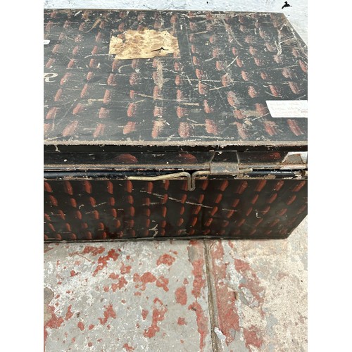 47 - A WWI Royal Naval Volunteer Reserve black metal twin handled travel trunk, signed to top 'R. H. Enoc... 