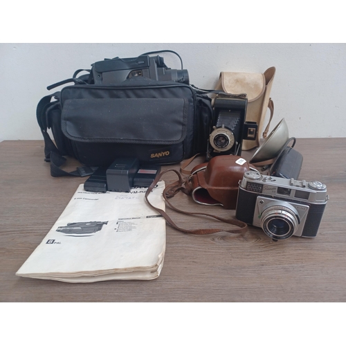 797 - Three cased items, one late 1950s Kodak Retinette IIB 35mm viewfinder camera, one Kodak Six-20 'Brow... 