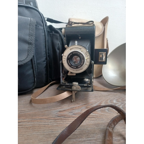 797 - Three cased items, one late 1950s Kodak Retinette IIB 35mm viewfinder camera, one Kodak Six-20 'Brow... 