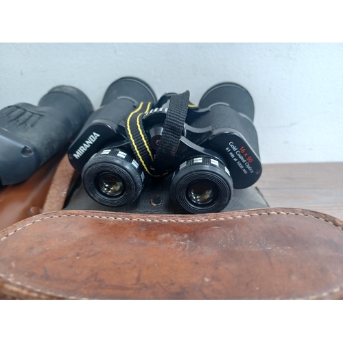 802 - Seven pairs of binoculars to include Chinon, Greenkat 8 x 30, Palar 16 x 50, Pathéscope 10 x 50, Mir... 