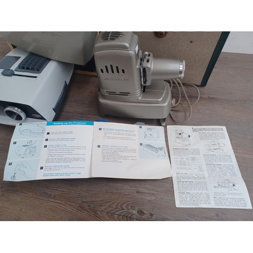 805 - Two Aldis slide projectors with instructions, one boxed XT434 automatic and one cased Aldisette