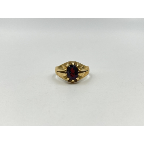 1187 - A hallmarked London 9ct gold textured garnet solitaire ring, size U - approx. gross weight 4.91 gram... 