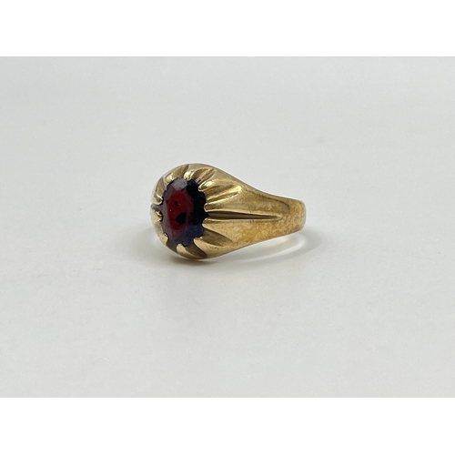 1187 - A hallmarked London 9ct gold textured garnet solitaire ring, size U - approx. gross weight 4.91 gram... 