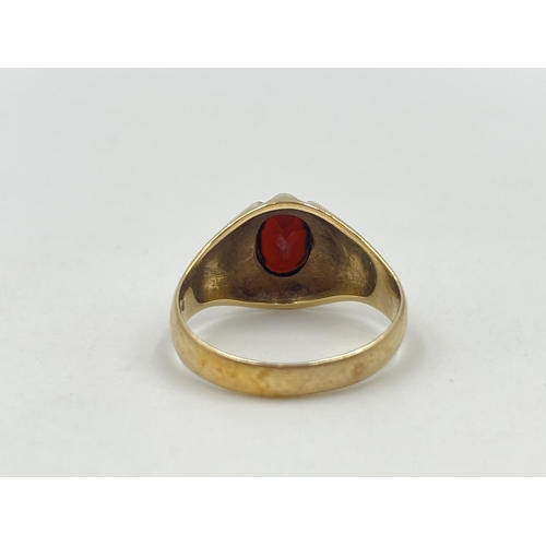 1187 - A hallmarked London 9ct gold textured garnet solitaire ring, size U - approx. gross weight 4.91 gram... 