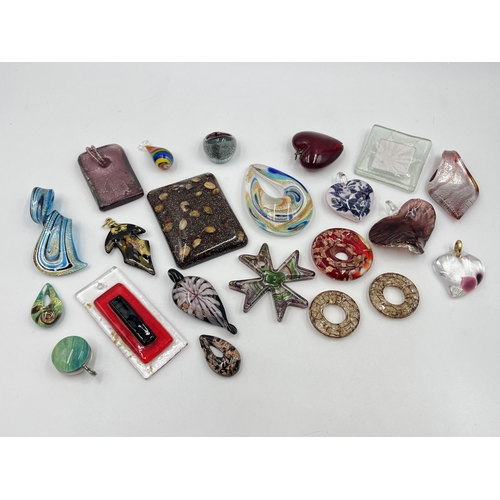 1198 - A collection of art glass pendants