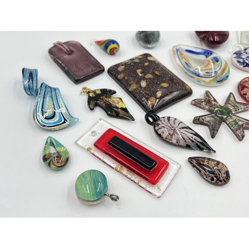 1198 - A collection of art glass pendants