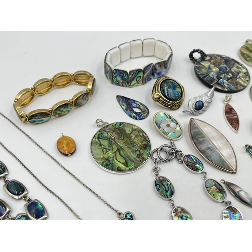 1202 - A collection of abalone shell jewellery