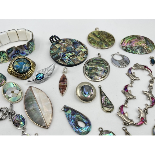 1202 - A collection of abalone shell jewellery