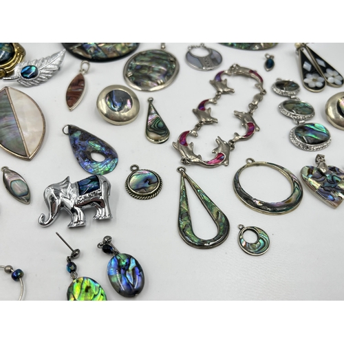 1202 - A collection of abalone shell jewellery