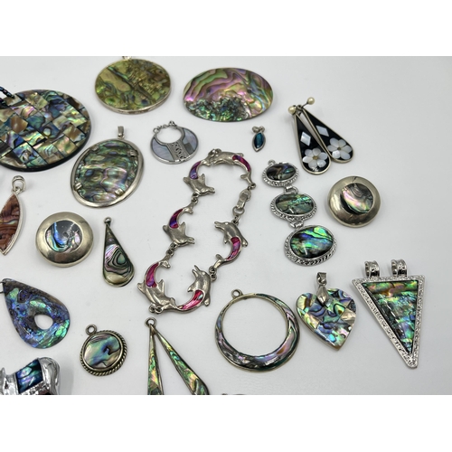 1202 - A collection of abalone shell jewellery