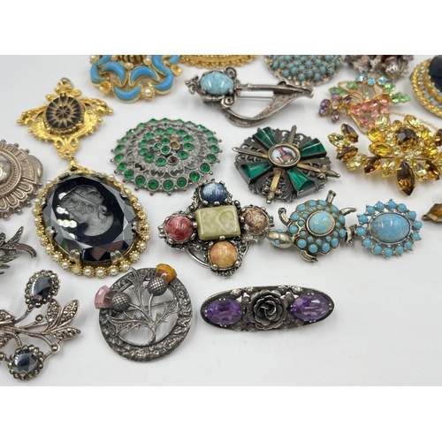 1217 - A collection of vintage brooches to include three silver and marcasite, silver Scottish thistle, Mir... 