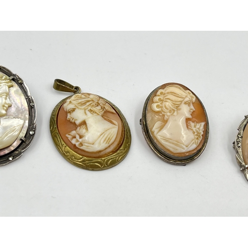 1218 - Five vintage cameo pendants/brooches, four .800 silver and one brass