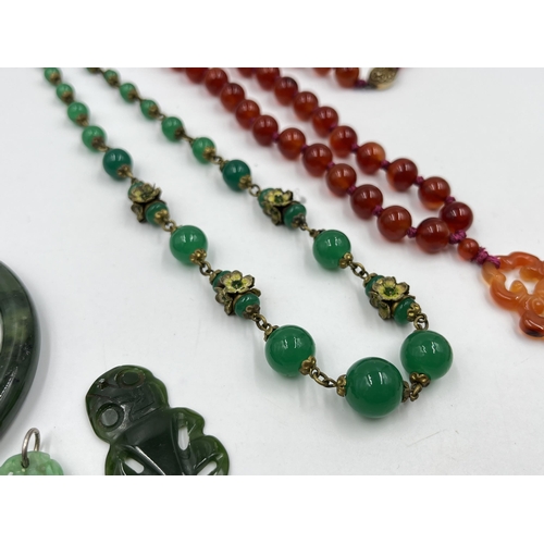 1220 - Five pieces of Oriental gemstone jewellery to include carnelian amulet pendant necklace with silver ... 