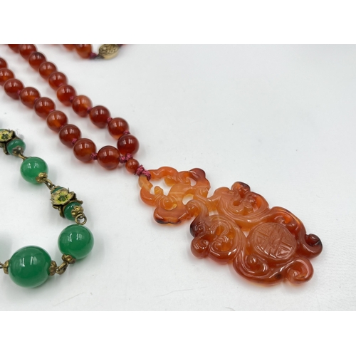 1220 - Five pieces of Oriental gemstone jewellery to include carnelian amulet pendant necklace with silver ... 