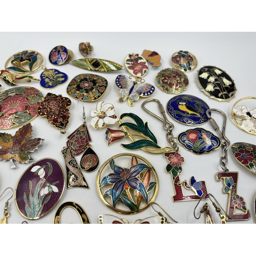 1222 - A collection of enamel jewellery to include brooches, earrings etc.