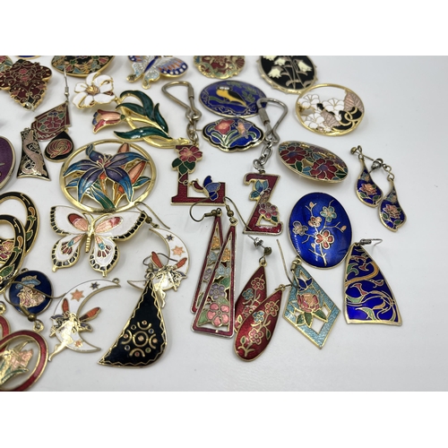 1222 - A collection of enamel jewellery to include brooches, earrings etc.