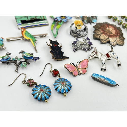 1227 - A collection of vintage enamel jewellery to include silver parrot brooch, miniature folding pocket k... 