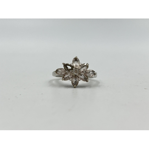 1233B - A hallmarked 9ct white gold CZ floral cluster ring, size N½ - approx. gross weight 3.56 grams