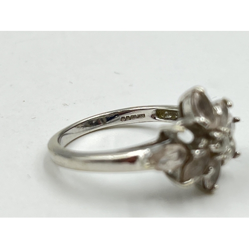 1233B - A hallmarked 9ct white gold CZ floral cluster ring, size N½ - approx. gross weight 3.56 grams