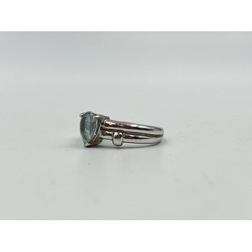 1233C - A hallmarked 9ct white gold aquamarine solitaire ring, size N½ - approx. gross weight 3.55 grams