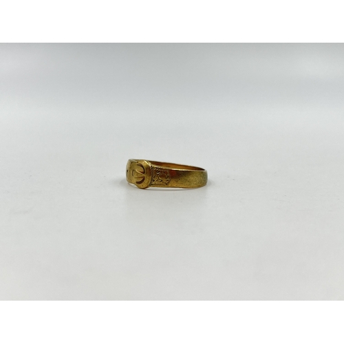 1239 - A hallmarked Birmingham 9ct gold buckle ring, size N½ - approx. gross weight 2.13 grams