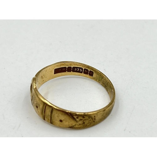 1239 - A hallmarked Birmingham 9ct gold buckle ring, size N½ - approx. gross weight 2.13 grams