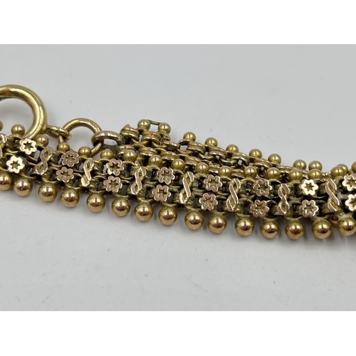 1240 - A Victorian 9ct gold 22cm floral panel bracelet - approx. gross weight 14.84 grams