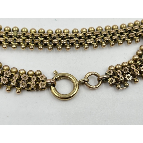 1240 - A Victorian 9ct gold 22cm floral panel bracelet - approx. gross weight 14.84 grams